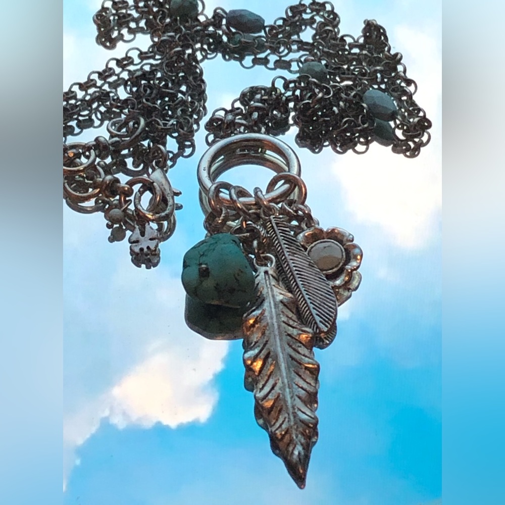 Lucky Brand Turquoise and silver necklace with feather charms.